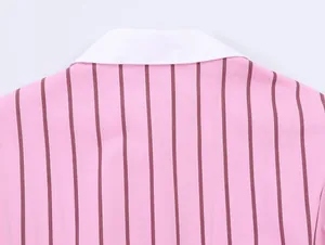 Close-up of pink vertical striped shirt collar with white contrast lapel detailing.
