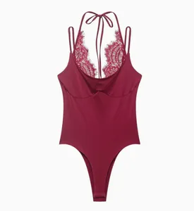 Detailed view of burgundy lace halter bodysuit with floral embroidery for elegant women's wear