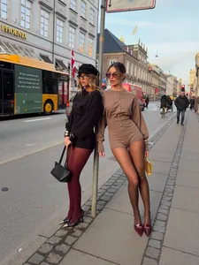 Street style scene showing details of knitted slim-fit cardigan and shorts sets