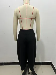 Back view of black fashion casual bucket trousers on a mannequin for fit detail.