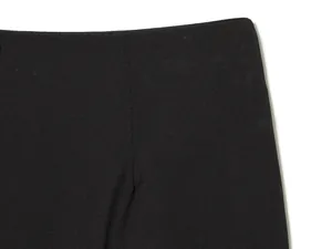 Detailed close-up view of black high-waisted casual pants showing the fine fabric texture