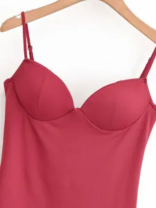 Detailed view of burgundy camisole top with molded underwire cups and thin straps