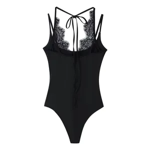 Detailed back view of a black lace patchwork halter neck bodysuit with delicate tie-up straps