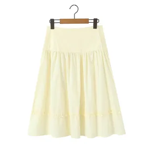 Elegant pale yellow A-line tiered skirt with ruffle hem detail and side buttons