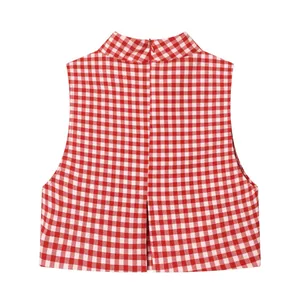 Detailed view of a red and white gingham sleeveless high-neck cropped top