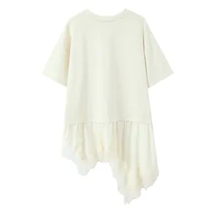 Cream-colored asymmetrical T-shirt featuring intricate lace patchwork detail at the hem