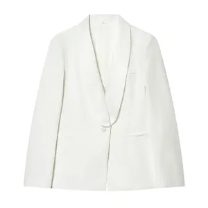 Close-up of a white stylish tuxedo collar blazer showing lapel and button detail.