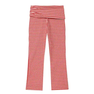 High-waisted red and white gingham plaid trousers with a fold-over waistband detail