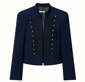 Detailed view of navy blue military style blazer featuring gold braided button accents