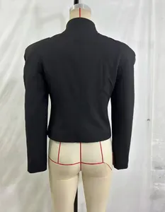 Detailed back view of a slim-fit black blazer featuring structured padded shoulders