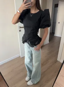 Black puff sleeve blouse with lace trim shown in a full-length mirror selfie view