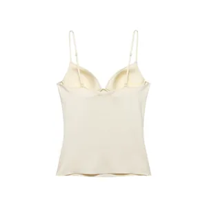 Close-up of a cream nylon blend camisole with built-in bra cups and adjustable straps