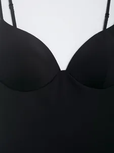 Close-up of a sleek black nylon blend camisole top with a sweetheart neckline and straps