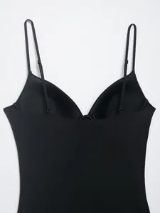 Detailed view of black nylon blend bodysuit with built-in bra cups and straps