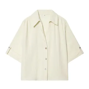 Elegant cream short sleeve button-up shirt with lapel collar and soft crinkled texture