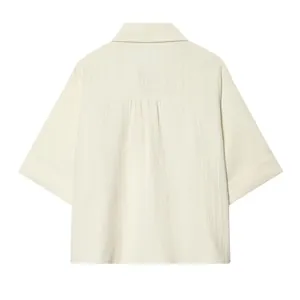 Detailed back view of a cream short-sleeved shirt featuring a crinkled textured fabric