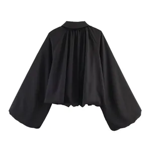 Veste bomber noire pour femme avec revers et manches ballon spectaculaires, vue arrière.