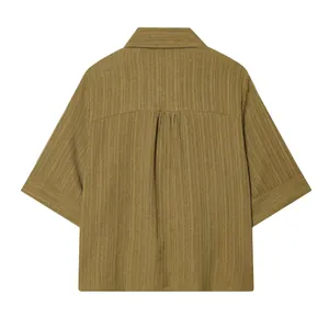 Detailed back view of a women's olive green textured short sleeve shirt with lapel collar