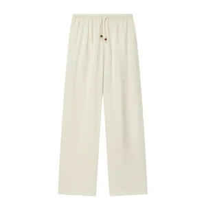 Comfortable cream wide-leg pants with adjustable drawstring waist and breathable fabric