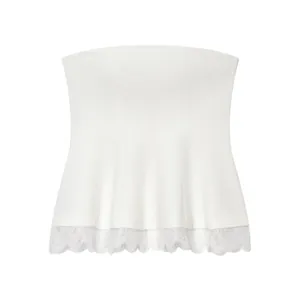 Detailed view of a white strapless tube top featuring a delicate floral lace hemline