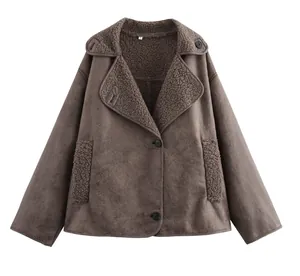 Front view detail of a brown faux suede jacket with lambswool lapel and buttons.