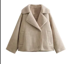 Stylish beige faux shearling jacket with wide lapel and front buttons detail view.