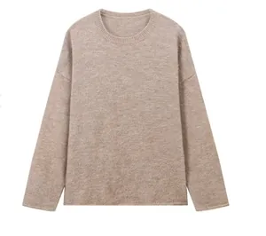 Front view of a soft oatmeal fuzzy long-sleeve crewneck pullover sweater for women