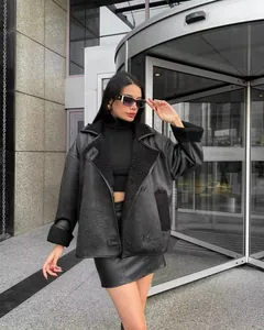 Chic black faux leather jacket with plush lamb wool lapel for urban street style