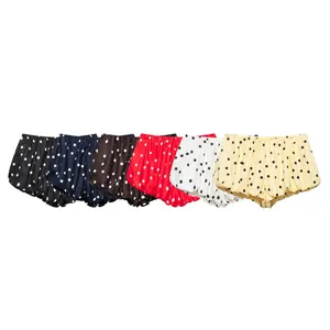 Fila de pantalones cortos con volantes para mujer con lunares en seis tonos vivos
