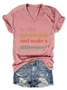 Detail of dusty rose V-neck T-shirt with colorful 'be like subtraction' slogan print