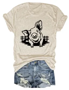 Vista dettagliata della t-shirt beige da donna con stampa grafica di maiale e girocollo.