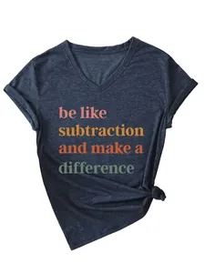 Close-up of navy V-neck T-shirt with 'be like subtraction' and colorful text print.