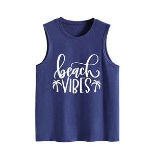 Close-up of beach vibes text and palm tree graphics on navy blue women's tank top