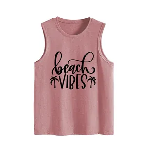 Detailed view of the black Beach Vibes graphic print on a dusty rose tank top