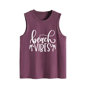 Detailed macro view of the white beach vibes print on a casual maroon tank top