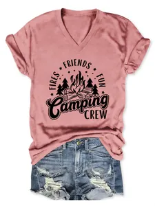 Close-up detail of the Camping Crew graphic print on a stylish pink V-neck t-shirt