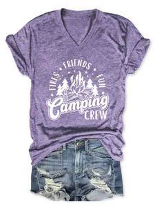 Macro view of purple V-neck heathered T-shirt with 'Camping Crew' white graphic print