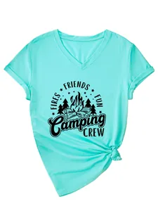 Detailed macro view of cyan women's V-neck T-shirt featuring black Camping Crew graphic print