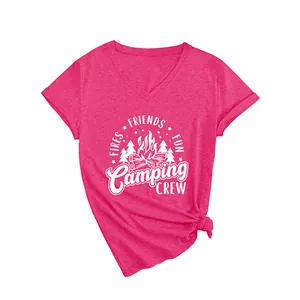 Stylish women's pink V-neck T-shirt featuring white Camping Crew campfire graphic