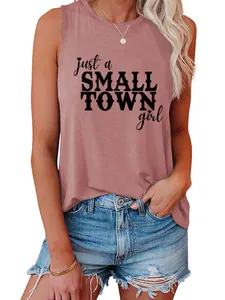 Close-up detail of mauve sleeveless tank top with 'just a small town girl' graphic print