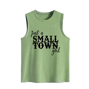 Macro detail of the just a small town girl slogan printed on a green sleeveless tank top