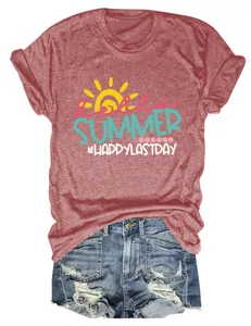 Close-up view of a rust red 'Hello Summer' graphic tee paired with denim shorts