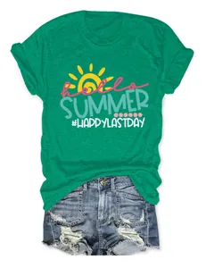 Close-up detail of the green Hello Summer graphic tee paired with ripped denim shorts