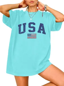 Close-up of women's light blue oversized T-shirt featuring a vintage USA flag print