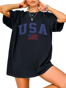 Close-up detail of the vintage USA text and flag print on a black oversized women's T-shirt