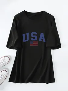 Oversized black T-shirt featuring a blue USA graphic and American flag print.