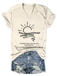 Detail of beige V-neck T-shirt with Forever Chasing Sunsets graphic print