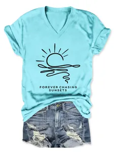 Women's light blue V-neck T-shirt featuring a stylish Forever Chasing Sunsets graphic print