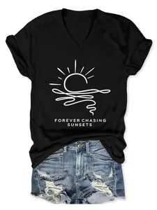 Black women's V-neck T-shirt detail featuring Forever Chasing Sunsets graphic print