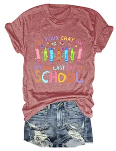 Detailed view of the rust-colored school-themed t-shirt with colorful crayon graphics